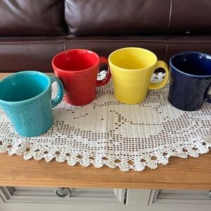 Fiesta Tapered mugs. Set of 4 have not been used. 15oz. Capacity.